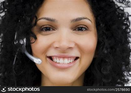 Close-up of a female customer service representative wearing a headset