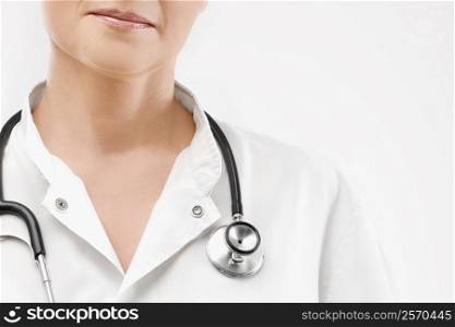 Close-up of a female doctor with stethoscope around neck