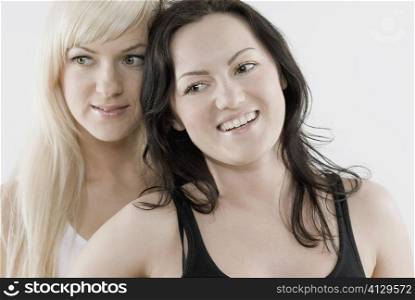 Close-up of a female homosexual couple smiling