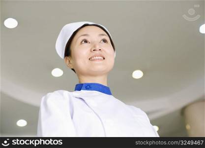 Close-up of a female nurse smiling