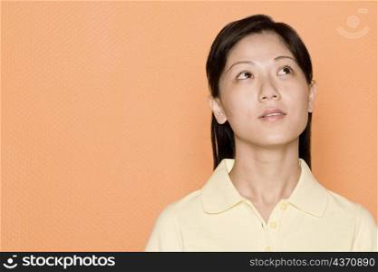 Close-up of a female office worker thinking