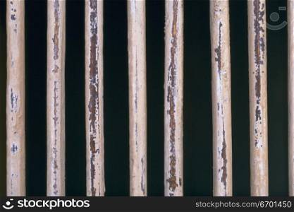 Close-up of a fence of metal rods