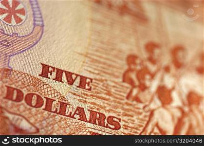 Close-up of a five dollar bill
