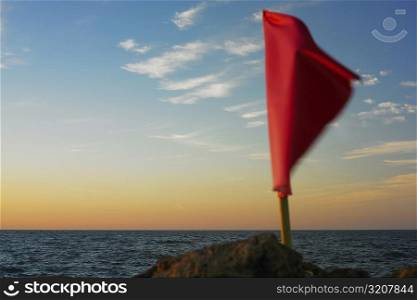 Close-up of a flag fluttering on a rock, Cartagena, Colombia