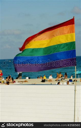 Close-up of a flag fluttering on the beach