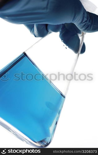 Close-up of a flask in a person&acute;s hand