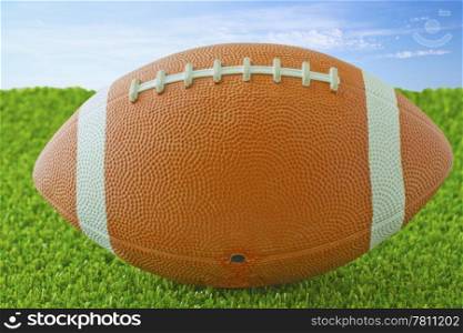 Close up of a football over green grass