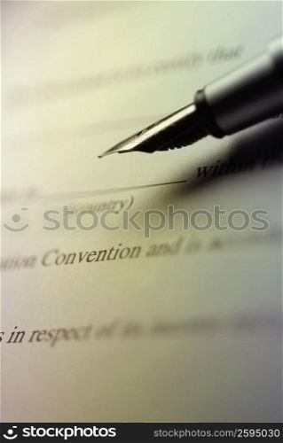 Close-up of a fountain pen on a sheet of paper