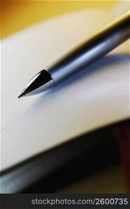Close-up of a fountain pen on a sheet of paper