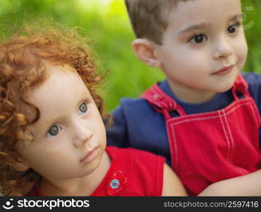 Close-up of a girl and her brother