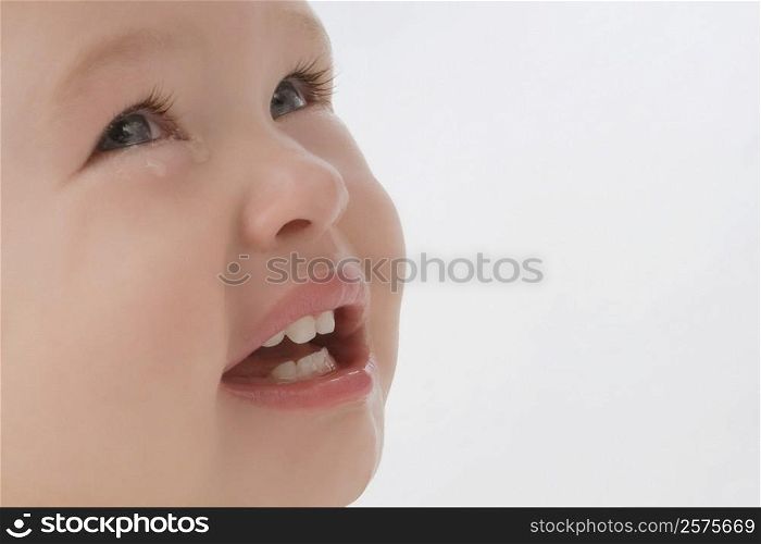 Close-up of a girl crying