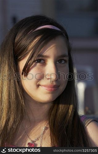 Close-up of a girl grinning