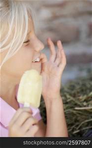 Close-up of a girl holding an ice-cream