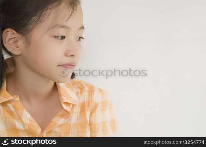 Close-up of a girl looking sideways