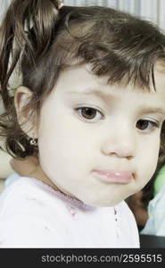 Close-up of a girl making a face