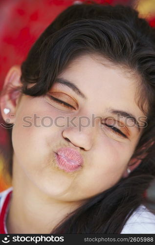 Close-up of a girl puckering