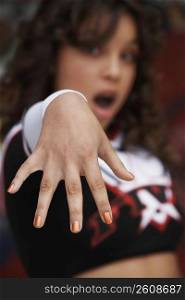 Close-up of a girl showing her fingers