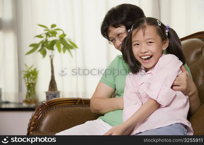 Close-up of a girl smiling with her grandmother