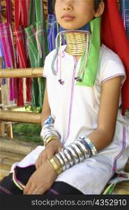 Close-up of a girl wearing a neckring, Chiang Khong, Thailand