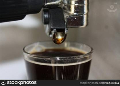 Close up of a glass filled with espresso coffee