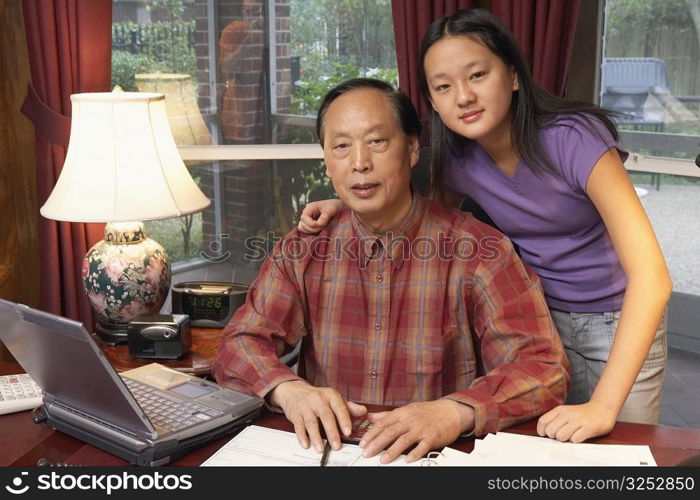 Close-up of a grandfather and his granddaughter