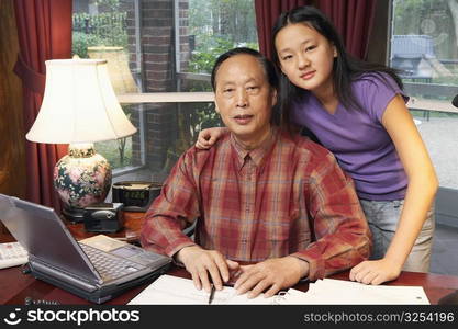 Close-up of a grandfather and his granddaughter