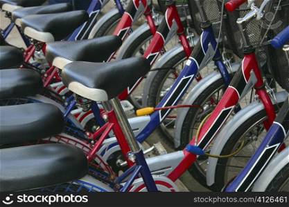 Close-up of a group of bicycles parked in a row, Vientiane, Laos