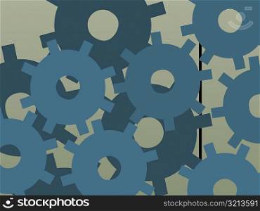 Close-up of a group of gears on a colored background