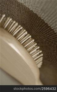 Close-up of a hairbrush with a mat