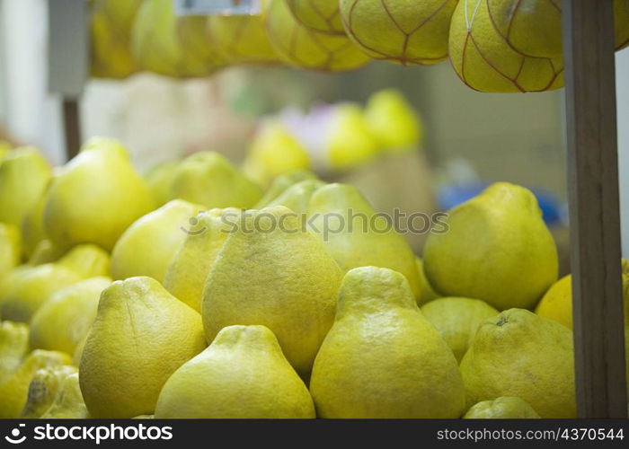 Close-up of a heap of pomelos in a store