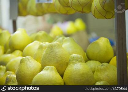 Close-up of a heap of pomelos in a store