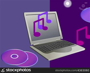 Close-up of a laptop with CD&acute;s and musical notes