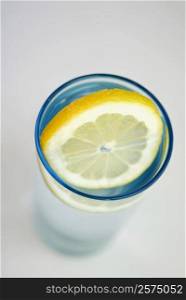 Close-up of a lemon slice in a glass