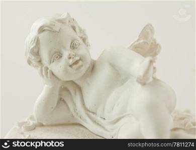 Close up of a little statue of an angel