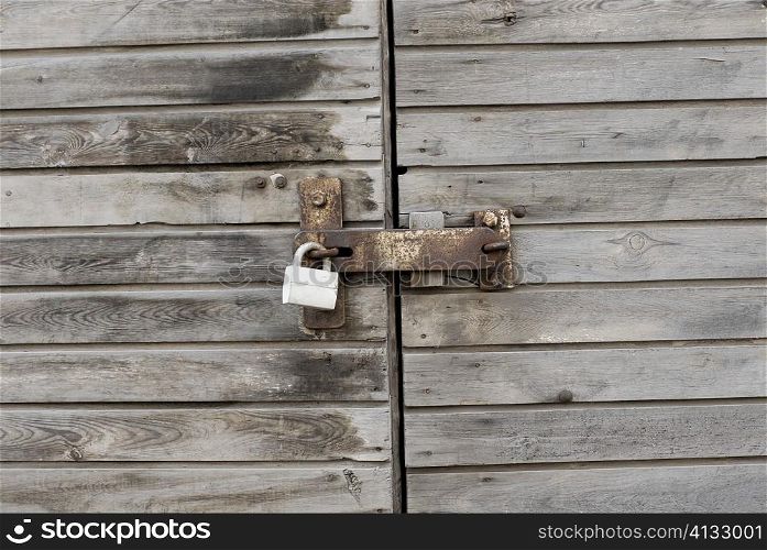 Close-up of a locked wooden door