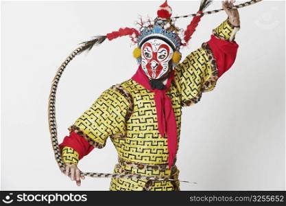 Close-up of a male Chinese opera performer gesturing