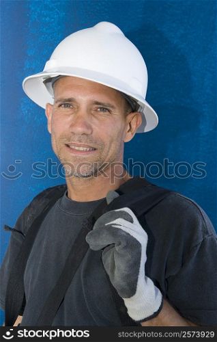 Close-up of a male construction worker smiling