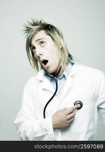 Close-up of a male doctor examining himself with a stethoscope