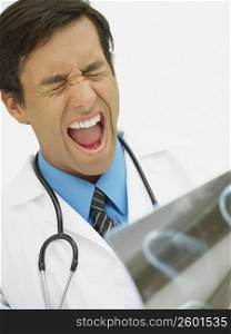 Close-up of a male doctor looking frustrated
