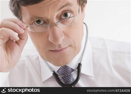 Close-up of a male doctor looking worried