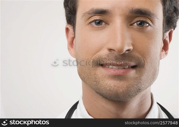 Close-up of a male doctor smiling