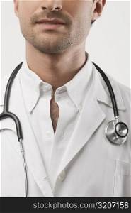 Close-up of a male doctor with a stethoscope around his neck