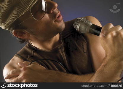 Close-up of a male singer singing