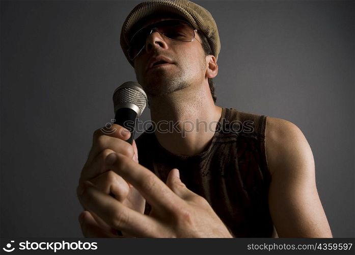 Close-up of a male singer singing