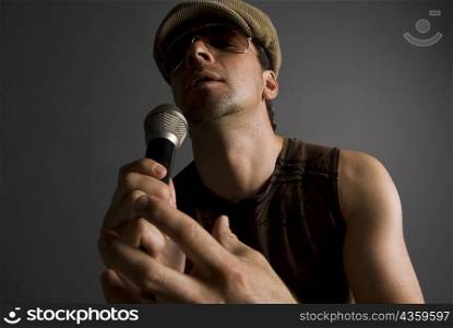 Close-up of a male singer singing