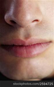Close-up of a man&acute;s mouth and nose