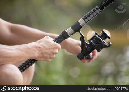 close up of a man is fishing