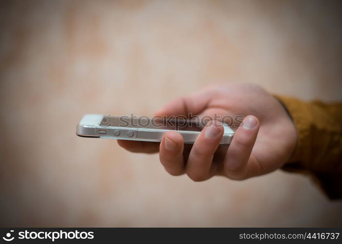 Close up of a man using mobile smart phone