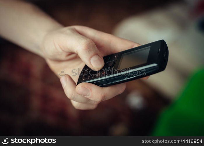 Close up of a man using mobile smart phone