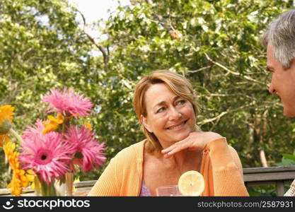 Close-up of a mature couple looking at each other and smiling